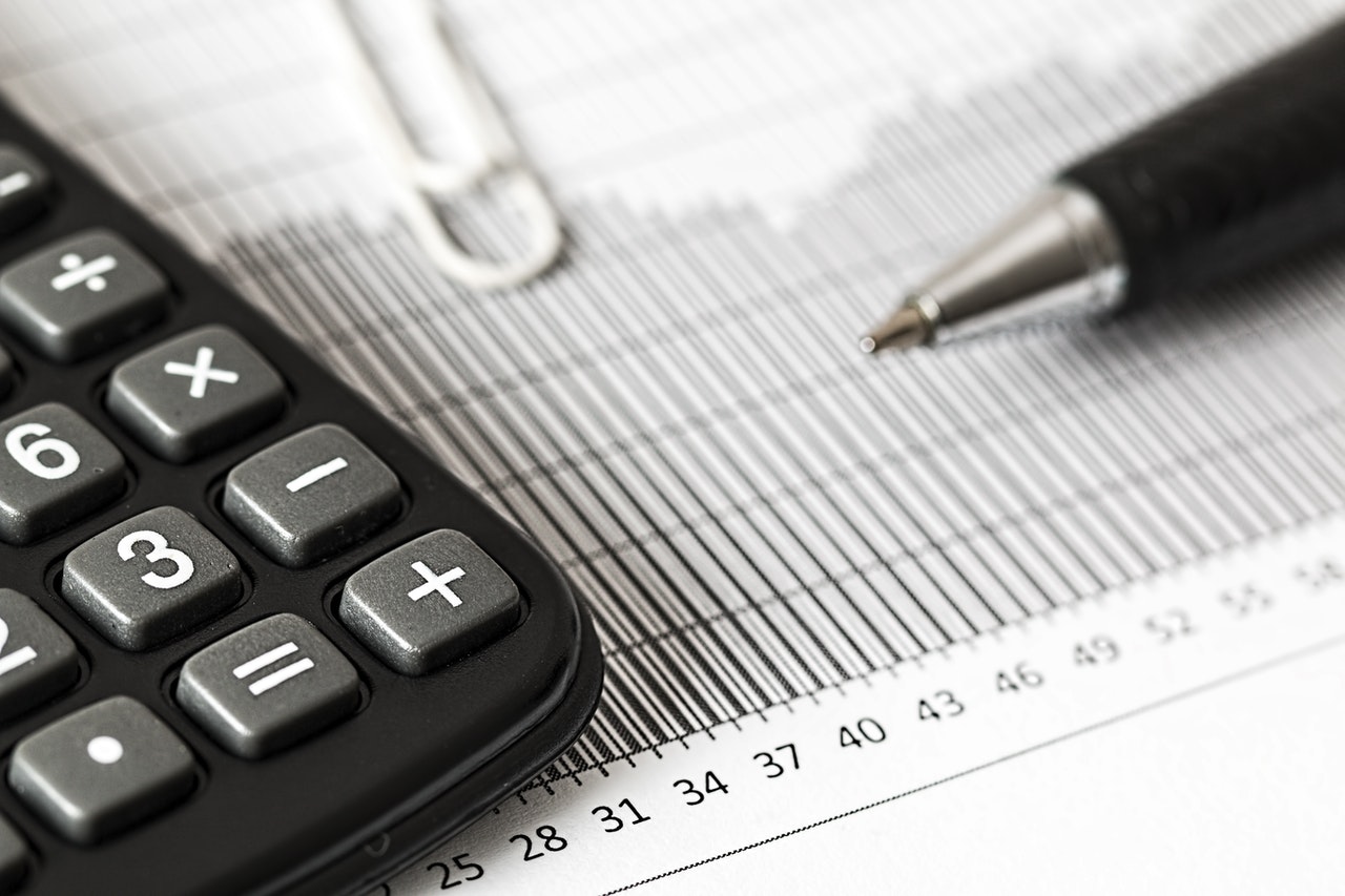 Closeup of calculator and data chart