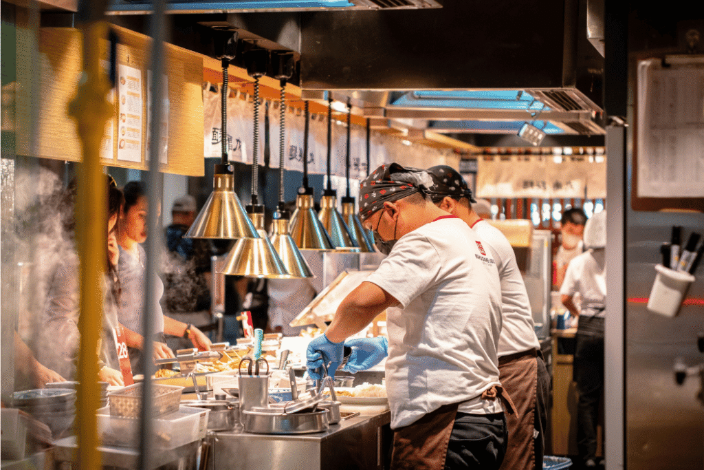 Restaurant workers preparing food