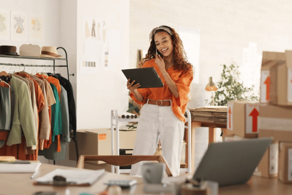 Woman holding tablet taking her business inventory
