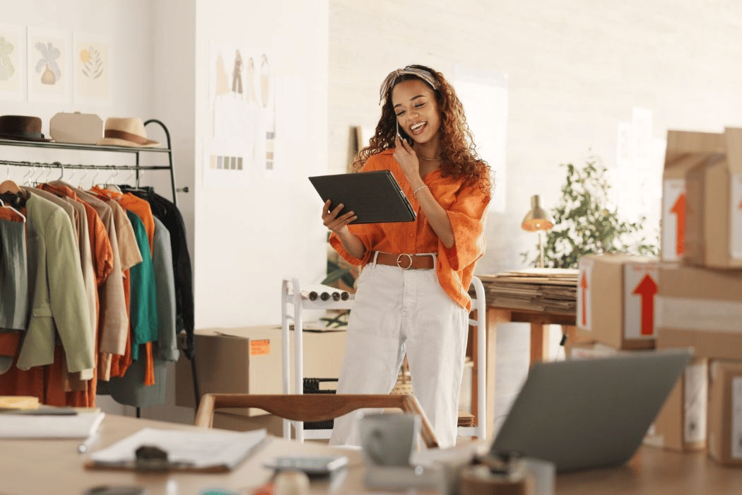 Woman holding tablet taking her business inventory
