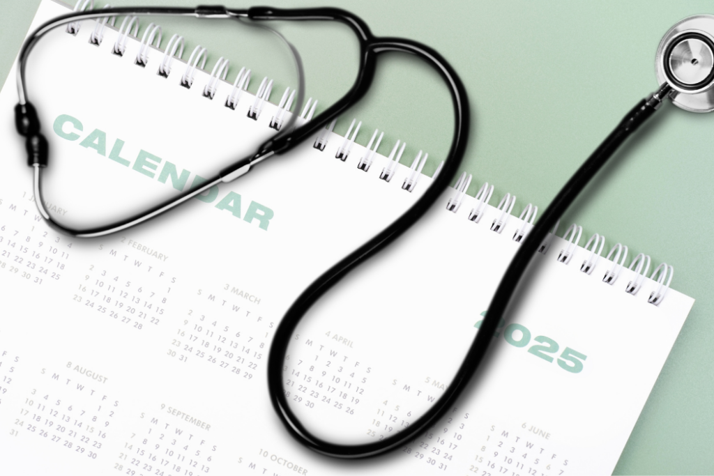 Desk setup with calendar and stethoscope — symbolizing mid-year reflection
