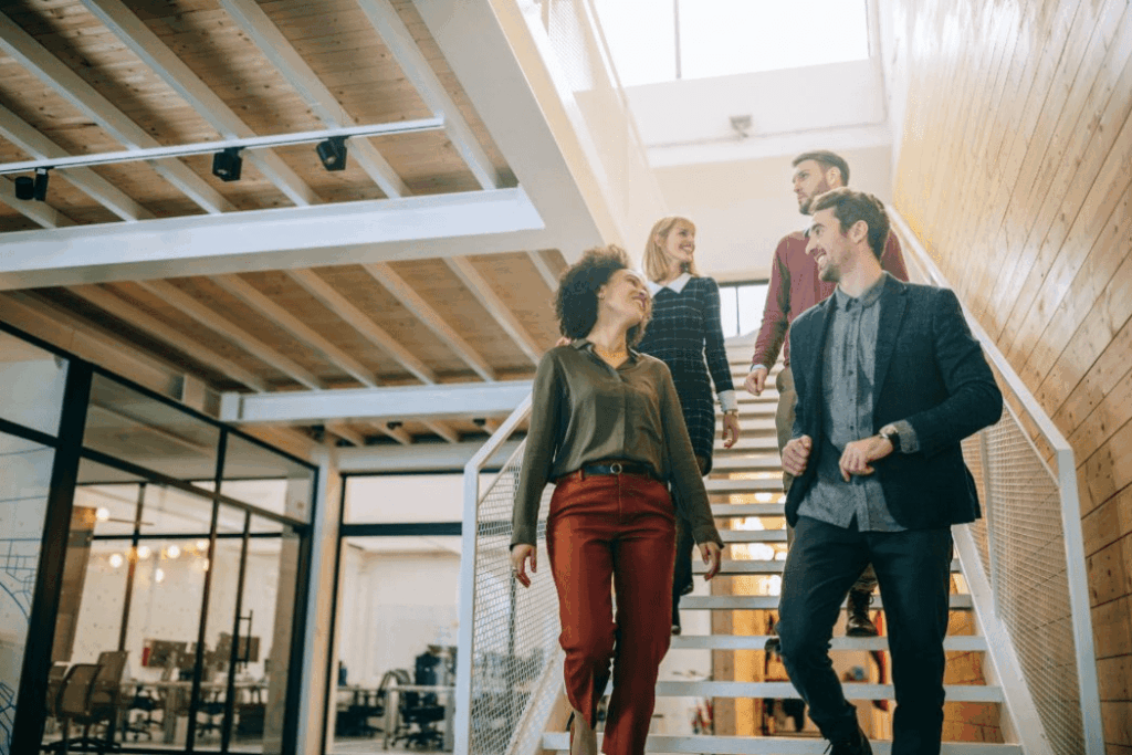 Employees walking down stairs
