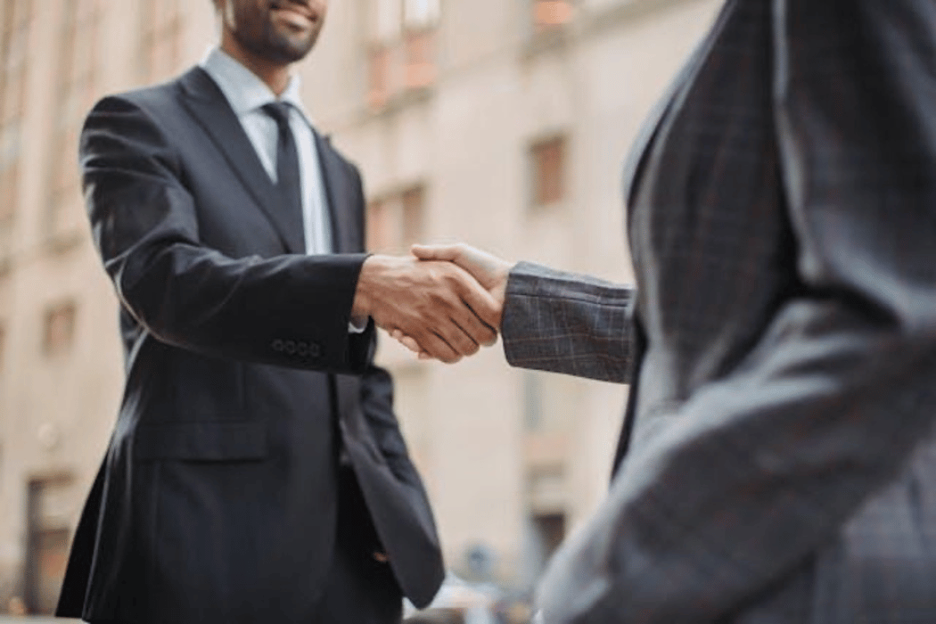 Minority entrepreneurs shaking hands