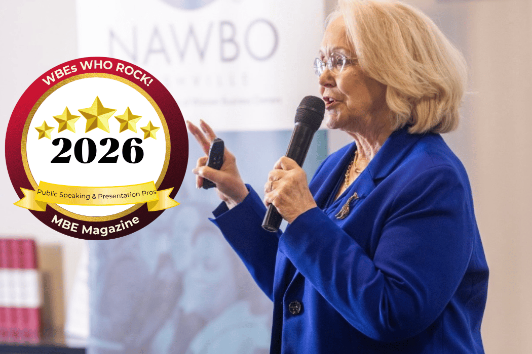 Liz Wool speaking to a group at NAWBO