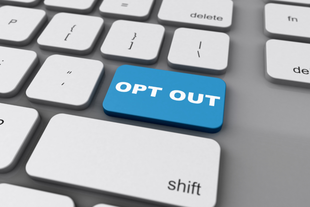 Closeup of computer keyboard with OPT OUT on the return key.