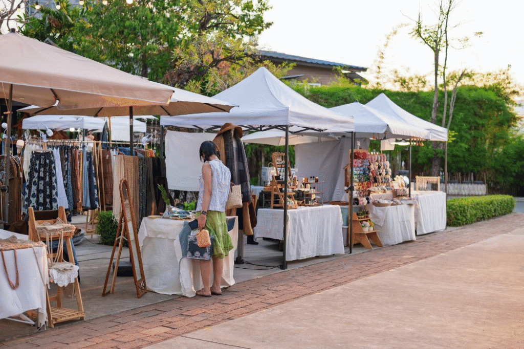Woman perusing items at vendor market