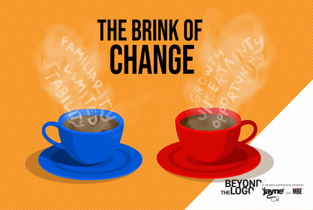 Red and Blue coffee cups on orange background